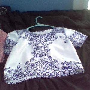 very cute worn 1 time white and blue crop top